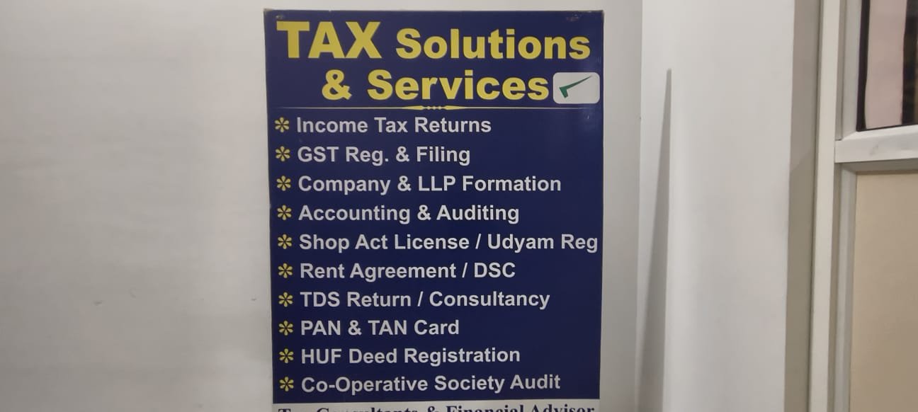Original Tax Solutions and Services sign listing the company’s services